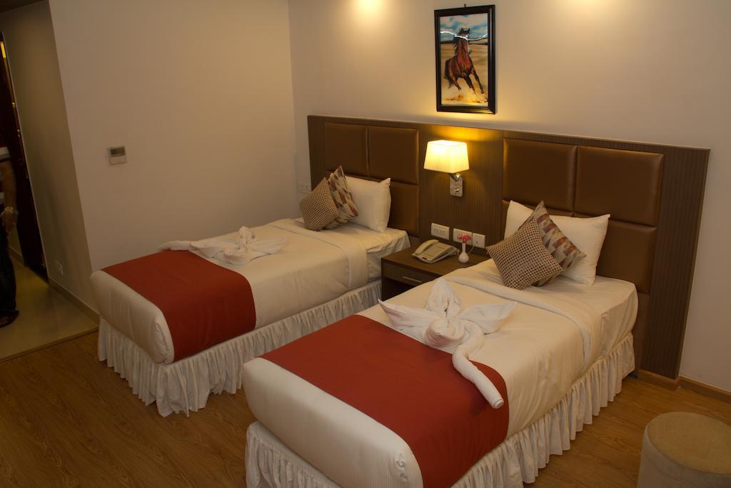 The Atrium Boutique Hotel Maisúr Pokoj fotografie